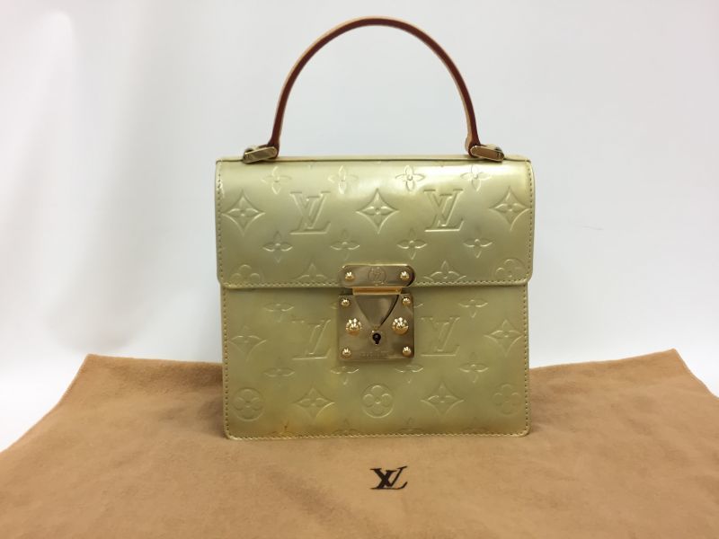 Refinished my damaged vintage Louis Vuitton Spring Street bag from yellow  to hot pink, just in time for Barbie Summer! : r/Louisvuitton